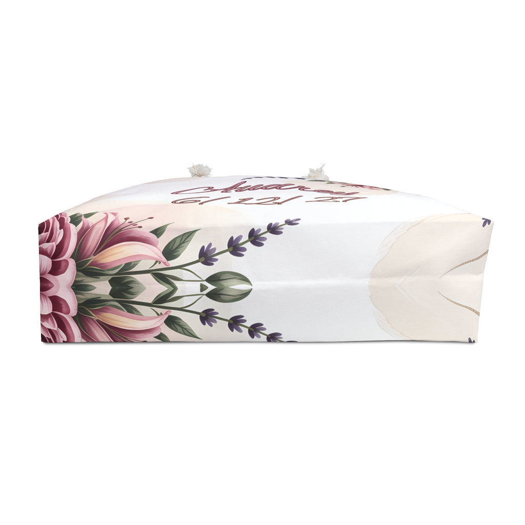 Floral personalized bride weekender bag showing side and bottom design